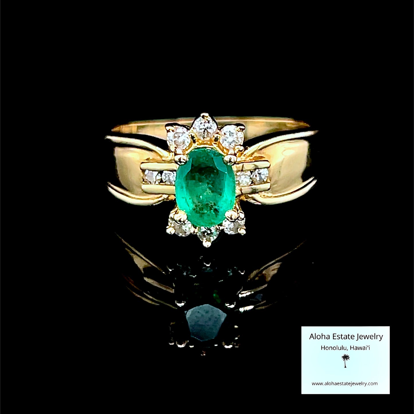 Vintage Oval Cut Columbian Emerald and Diamonds Ring
