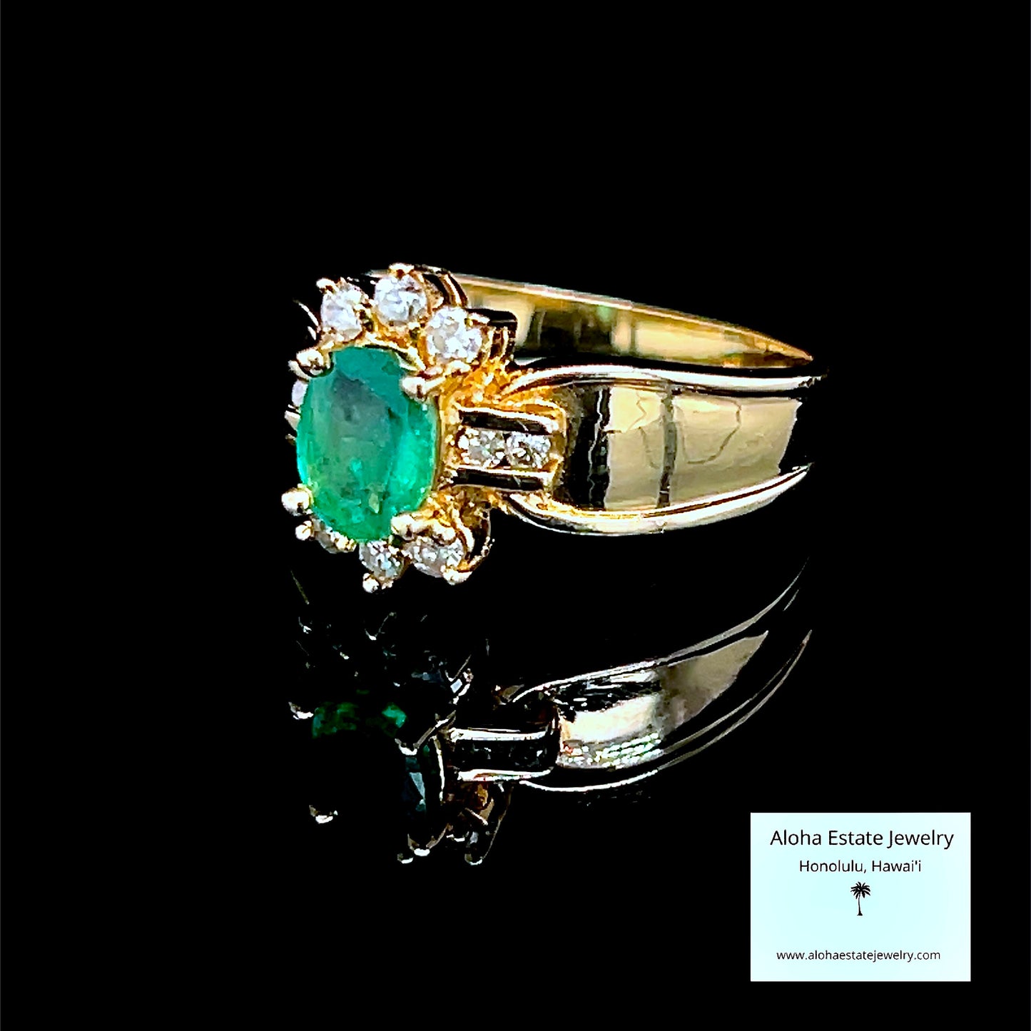 Vintage Oval Cut Columbian Emerald and Diamonds Ring